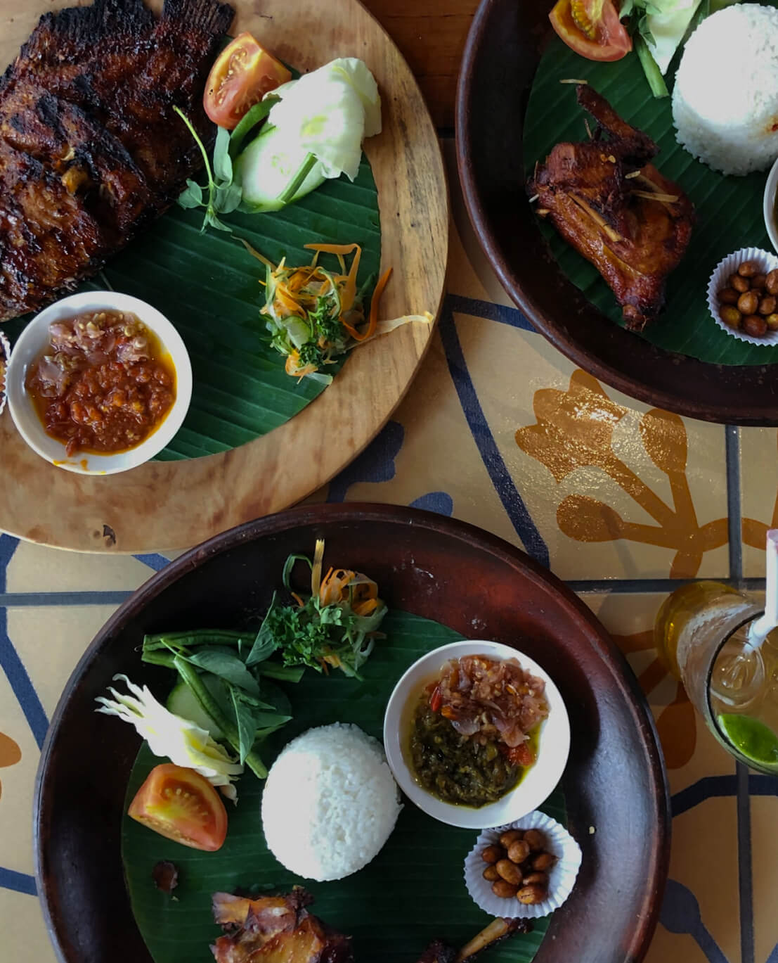 Fresh sate being grilled over hot coals — traditional Indonesian street food